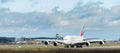 An Emirates Airline A380 Airbus taxis after landing at London Gatwick Airport